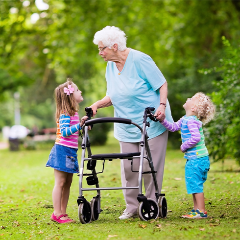 Grandma With Walker And Grandchildren